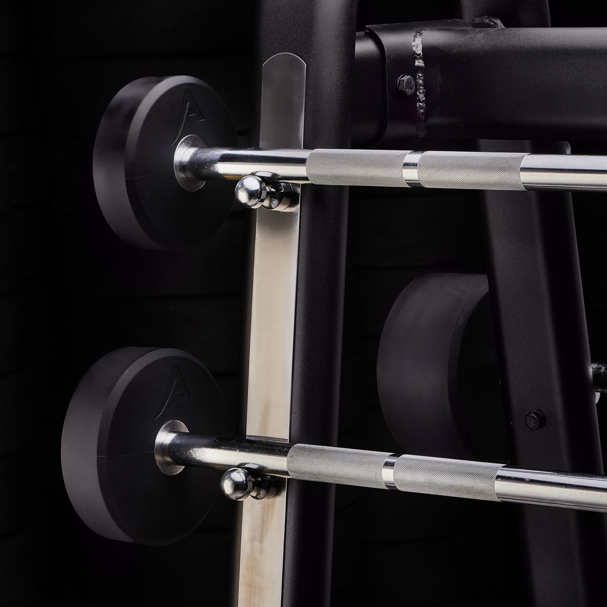 APUS pre-loaded polyurethaan barbell close up