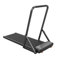 WalkingPad A1 Pro met handrail in moderne thuisomgeving