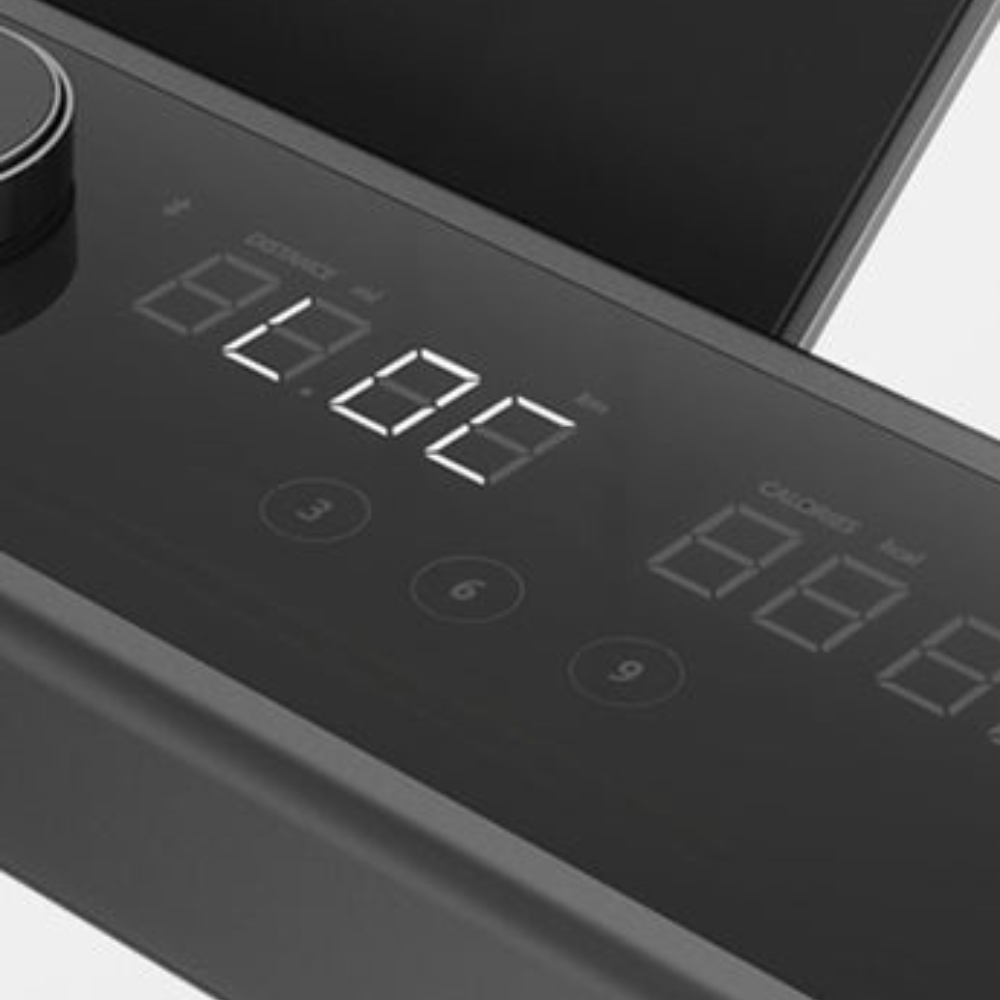 Compacte opvouwbare loopband met zijleuningen display